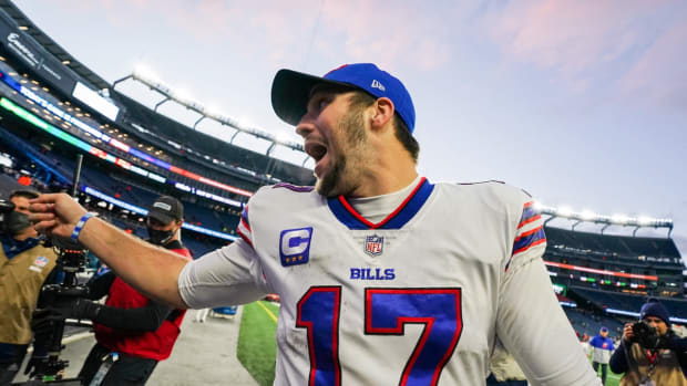 Dec 26, 2021; Foxborough, Massachusetts, USA; Buffalo Bills quarterback Josh Allen (17) reacts to the crowd after defeating the New England Patriots at Gillette Stadium. Mandatory Credit: David Butler II-USA TODAY Sports